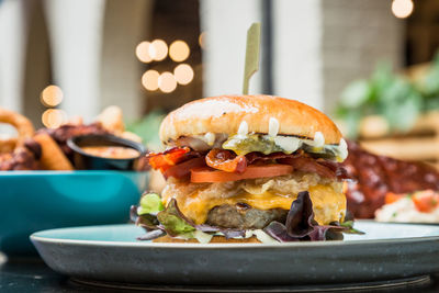 Close-up of burger in plate on table