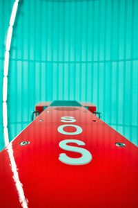 Close-up of information sign on table