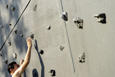 Children playing on wall