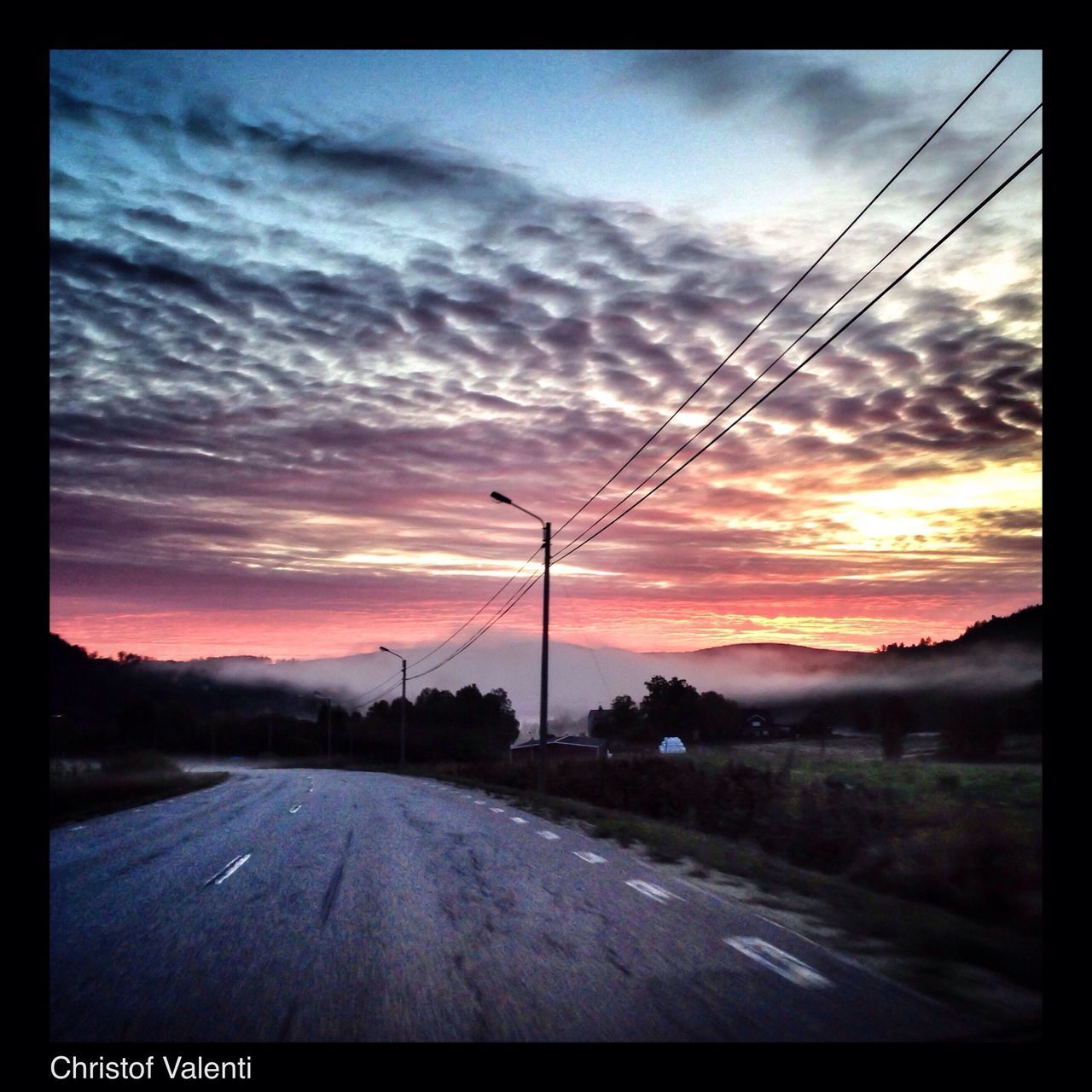 sunset, sky, electricity pylon, road, transportation, cloud - sky, landscape, power line, cloudy, the way forward, transfer print, dramatic sky, cloud, scenics, orange color, fuel and power generation, tranquil scene, electricity, tranquility, auto post production filter