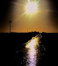 Scenic view of sunset over river