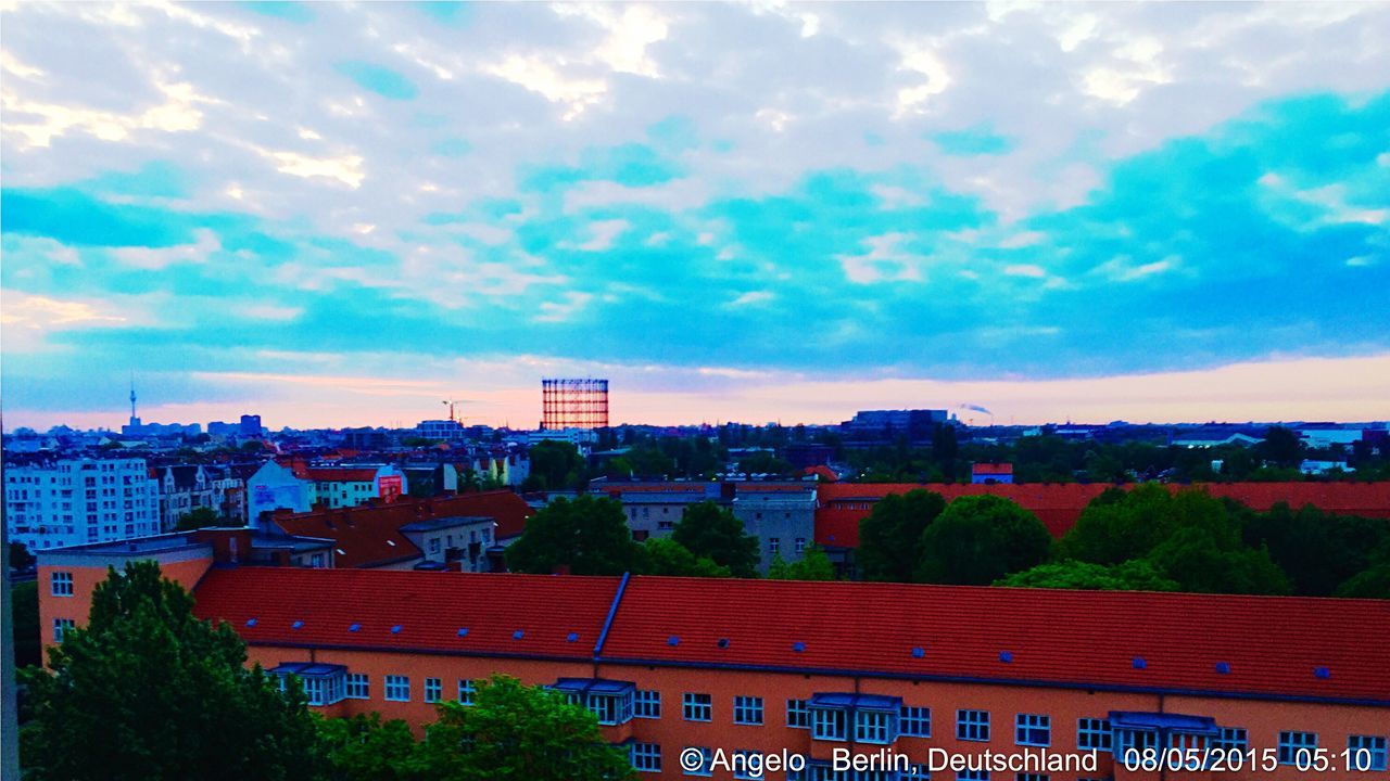 architecture, built structure, building exterior, sky, cloud - sky, city, cloud, cloudy, roof, residential structure, tree, residential building, cityscape, house, residential district, town, outdoors, crowded, no people, day