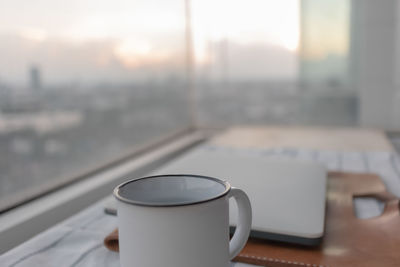 Close-up of coffee cup on table