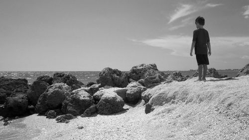 Rear view of man on beach