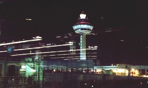 Low angle view of illuminated building at night