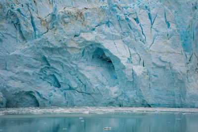 Scenic view of sea with glacier cave