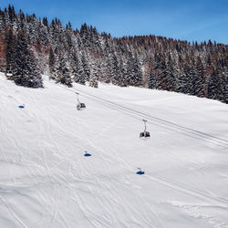 The gondola lift of this  french ski resort  called les gets brings you to the peak for skiing.