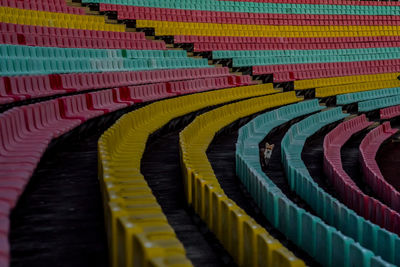 Multi colored seats in stadium