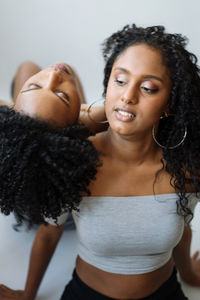 Close up two african woman next to each other portrait