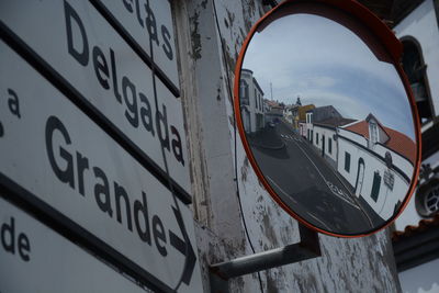 Reflection of street on traffic mirror