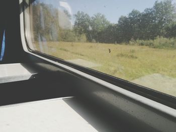 Window seen from inside of a train