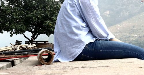 Woman sitting on bench