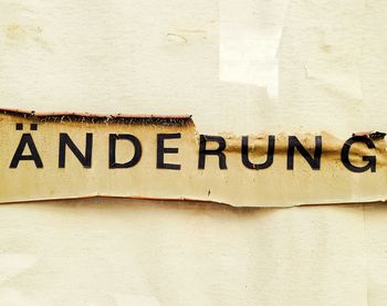 Close-up of text on wall