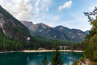 Scenic view of lake and mountains against sky