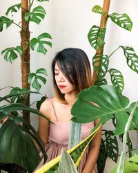 Young woman with plants in hair