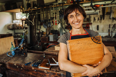 Portrait of smiling woman working