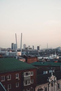 High angle view of buildings in city against sky