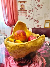 Close-up of fruits on table at home