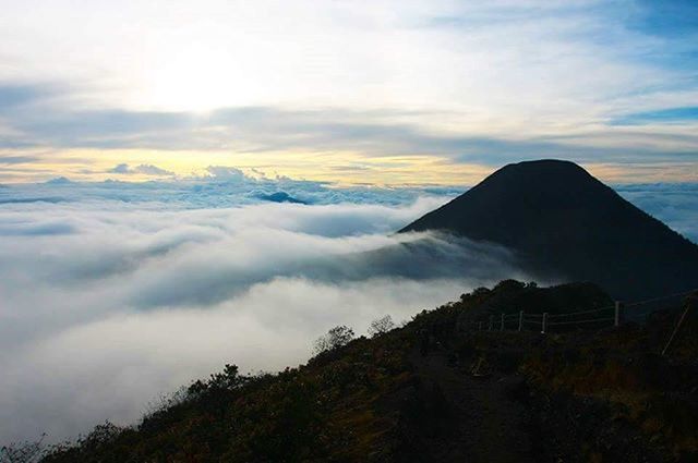 mountain, scenics, beauty in nature, tranquil scene, tranquility, sky, mountain range, landscape, cloud - sky, nature, weather, idyllic, physical geography, majestic, non-urban scene, cloud, snow, cloudy, winter, geology