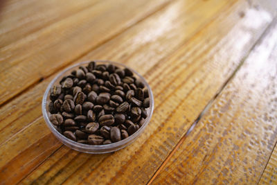 Close-up of coffee beans on table