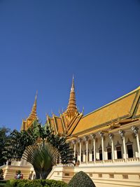 Low angle view of temple against blue sky