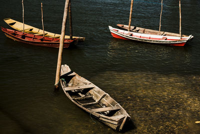 High angle view of sailboats moored on sea