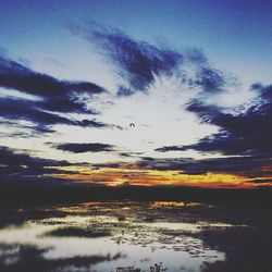 Scenic view of sea at sunset