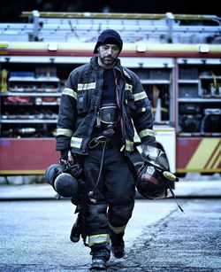 Full length portrait of man standing outdoors