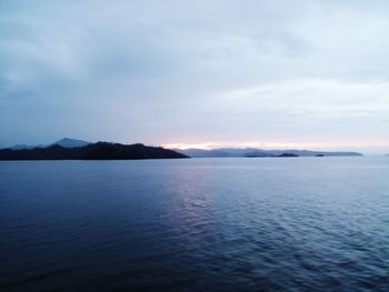 Scenic view of sea against sky at sunset