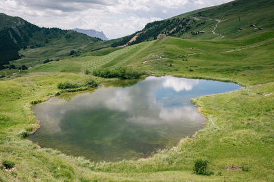 Scenic view of lake and mountains