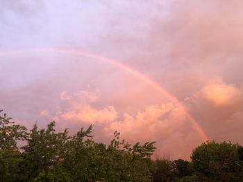 Low angle view of rainbow against sky