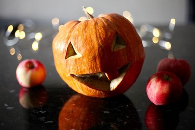 Close-up of pumpkin on table during halloween