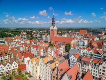 High angle view of townscape against cloudy sky