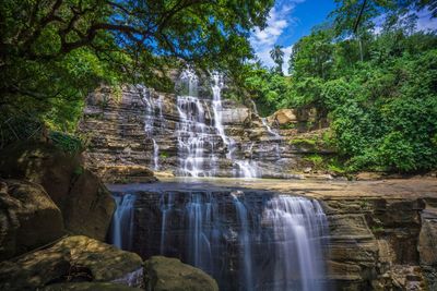 A waterfall consisting of 3 levels. the form of was caused by earthquake.