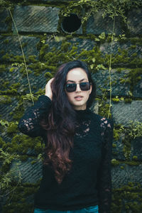 Portrait of young woman in sunglasses