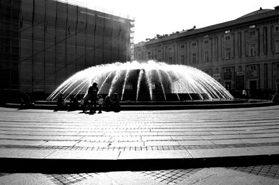 Fountain against built structures