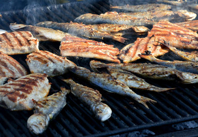 Grilled fish on charcoal