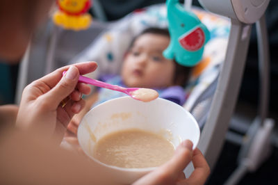 Close-up of woman hand holding drink