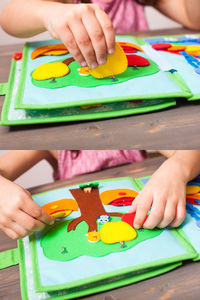 Midsection of boy holding ice cream on table