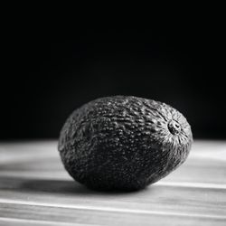 Close-up of avocado on table