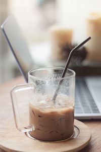 Close-up of coffee cup on table