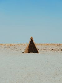 Tent on field against clear sky at atacama desert