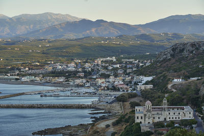 High angle view of townscape and mountains