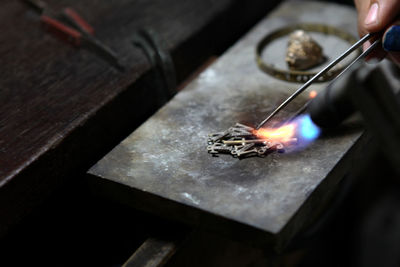 Man working on metal