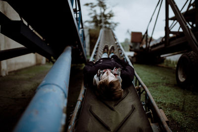 Full length of boy on slide