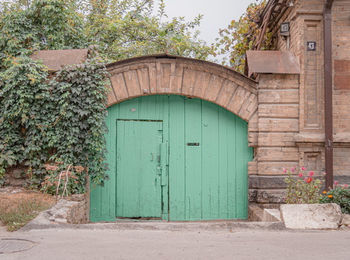 28th august, russia, pyatigorsk, wooden gate with vaulted facade