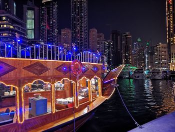 Illuminated buildings in city at night