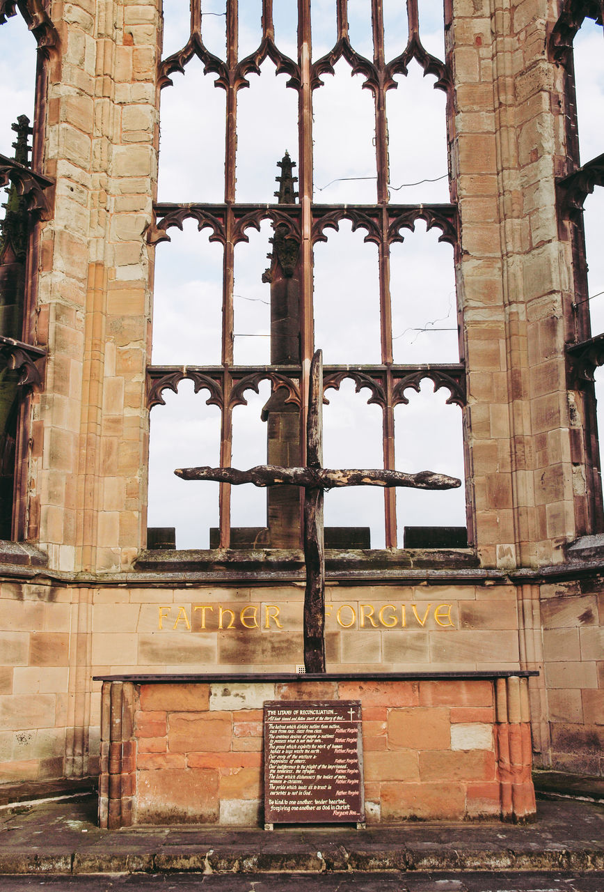 LOW ANGLE VIEW OF OLD ABANDONED BUILDING