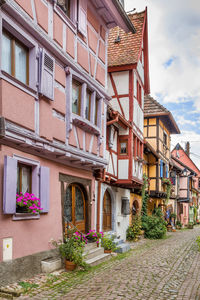 Picturesque historical street in eguisheim, alsace, france