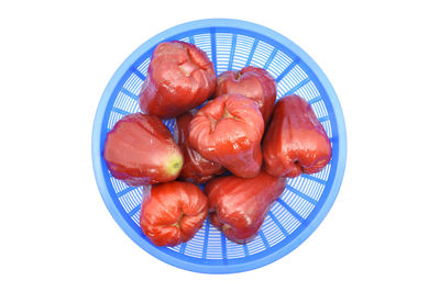 Close-up of meat on white background